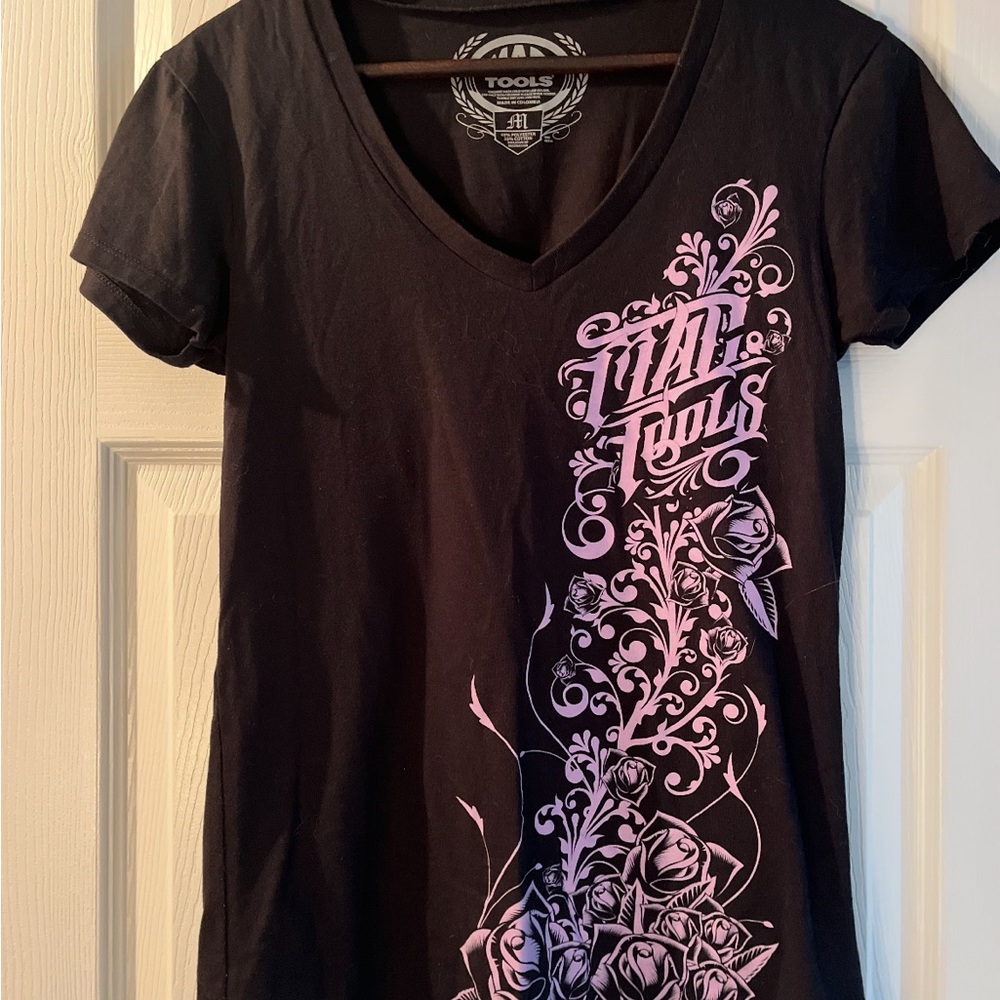 Elegant Black Tee with Pink Floral Design